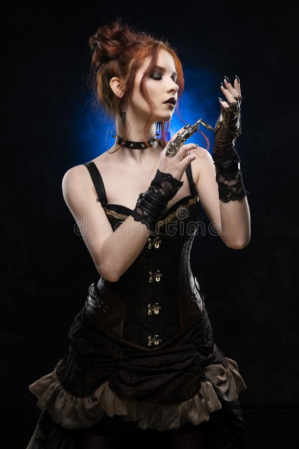 ../../../../1. Attachments/beautiful-redhead-cosplayer-girl-wearing-victorian-style-steampunk-costume-big-breast-deep-neckline-touches-pocket-watch-142326228.jpg